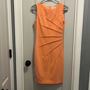 Fitter orange dress